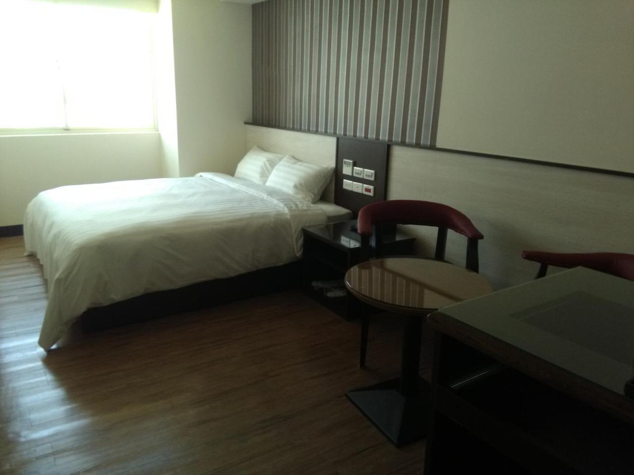 Dengfeng Milan Business Hotel Huwei Exterior photo