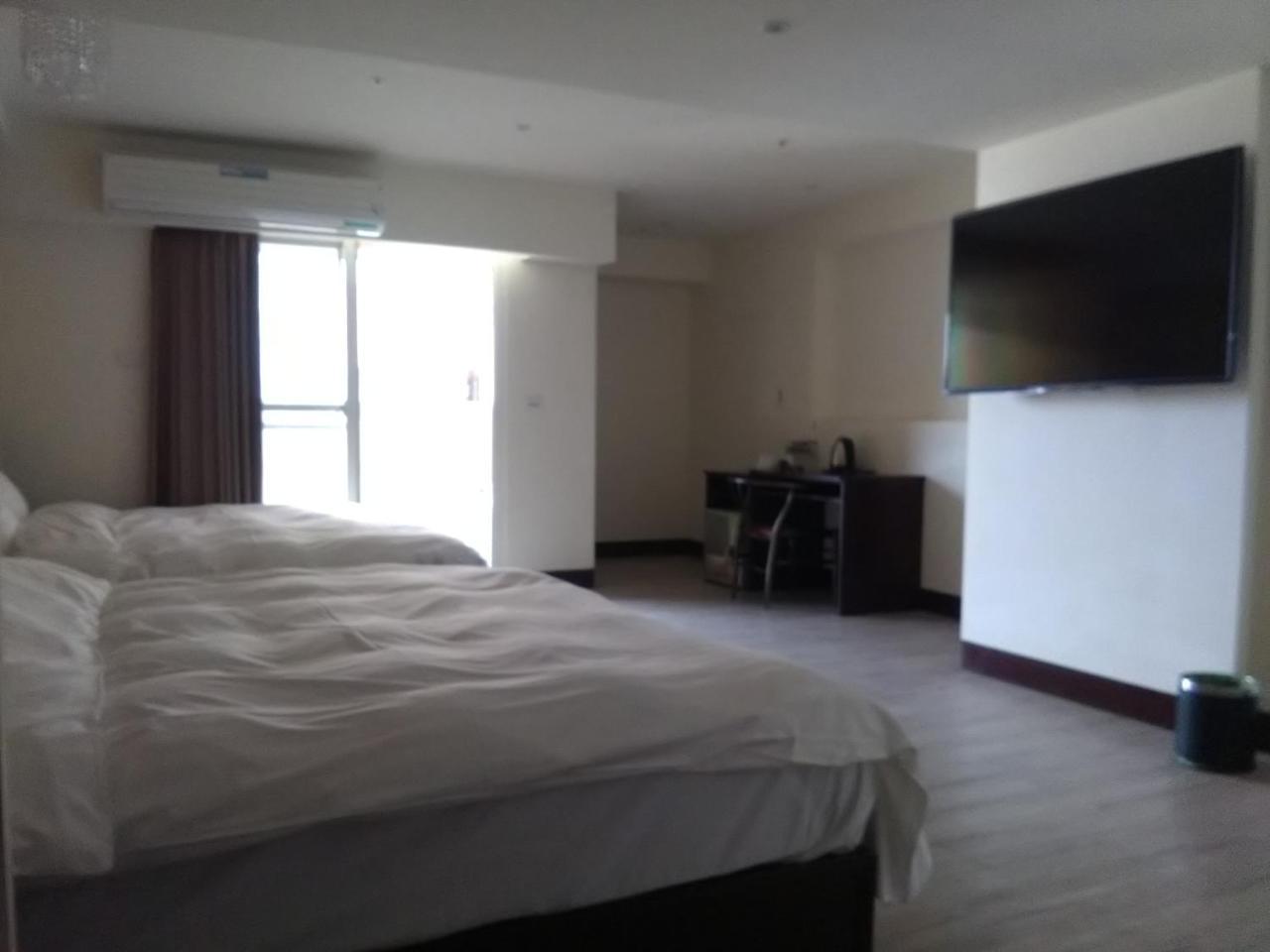 Dengfeng Milan Business Hotel Huwei Exterior photo